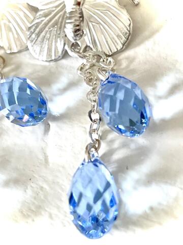 Sølv-Sommerfugle med LYSEBLÅ Light Sapphire Swarovski krystaller 